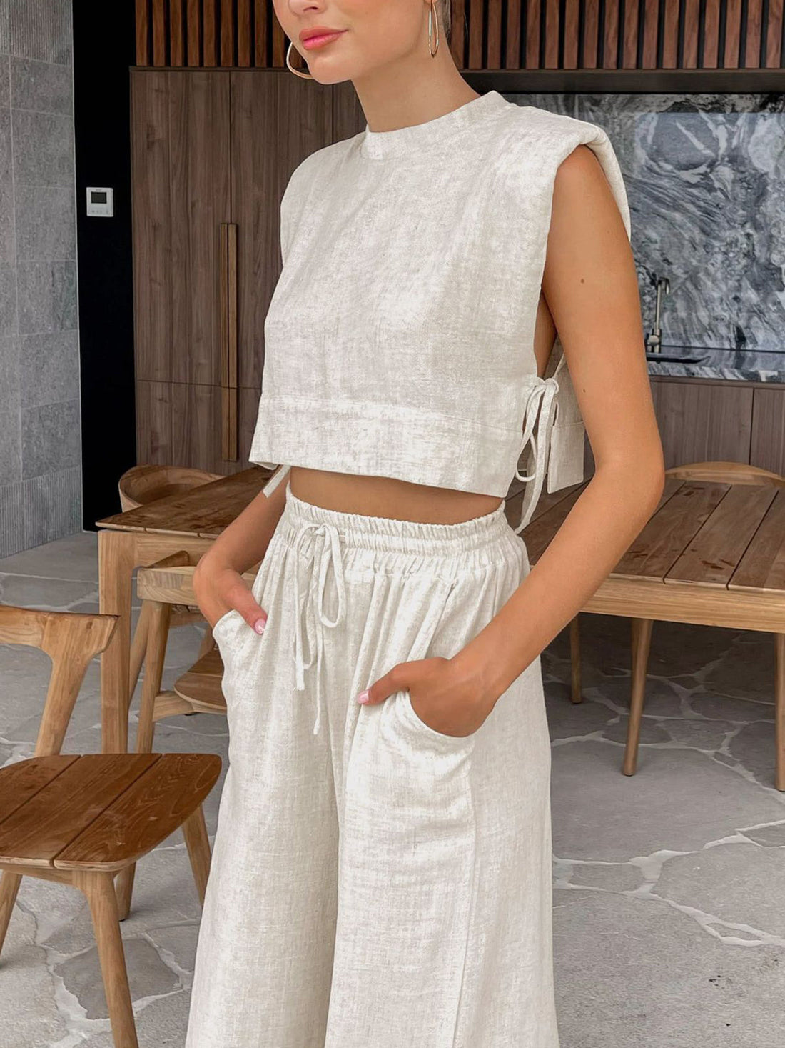 Women's sleeveless top and wide-leg pants set