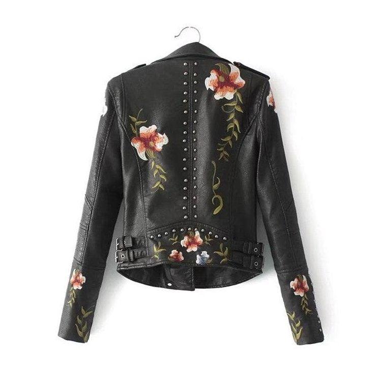 Women's elegant leather jacket with embroidery rivets